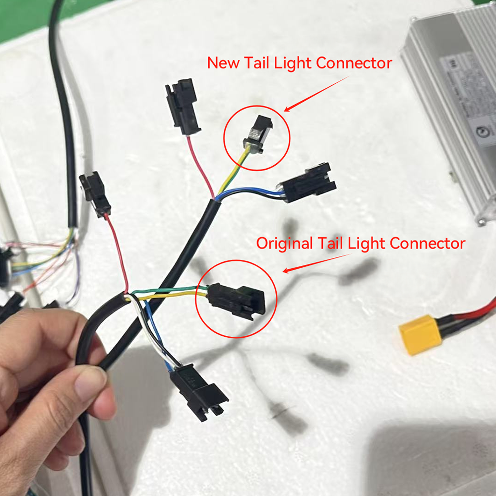 Comparison of new and old taillight connection ports